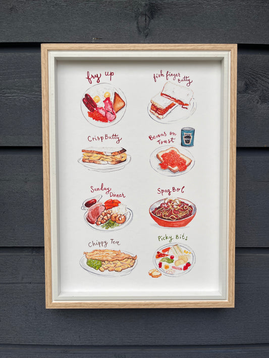 What’s for tea print featuring fry up, crisp butty and beans on today, framed in a light wooden frame hung on a wooden dark grey panelled wall